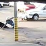 Motocicleta é atingida em cruzamento de Maringá e casal é arremessado em colisão com carro; vídeo