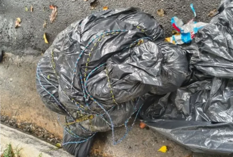 Sobe para nove o número de corpos encontrados em sacos de lixo